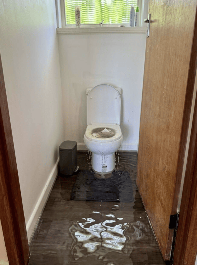 A flooding bathroom.