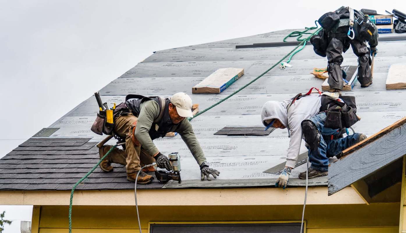 Workers on a roof.
