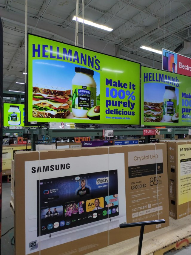 Hellmann's mayonnaise advertisements on TV screens.