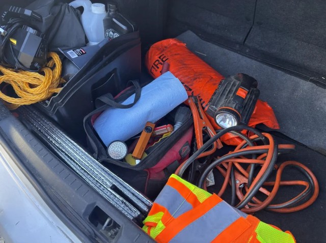 An emergency kit in a car trunk.