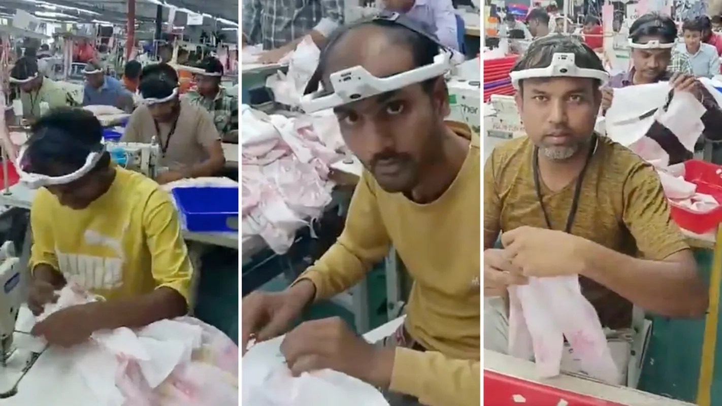 Workers in a textile factory are sewing garments at their stations with cameras on their foreheads.