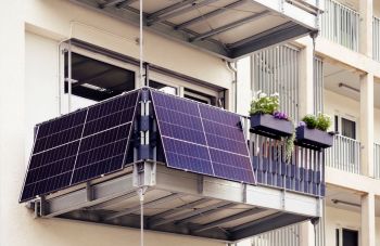 A balcony with solar panels.