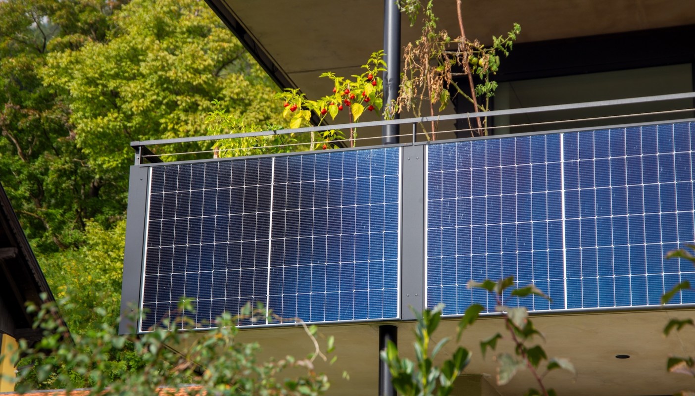 A balcony with solar panels.