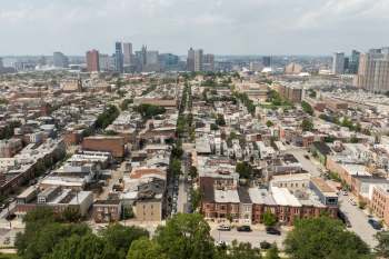 Baltimore Maryland neighborhood with the city skyline in the distance