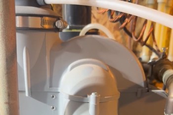 A hot water tank blower motor.