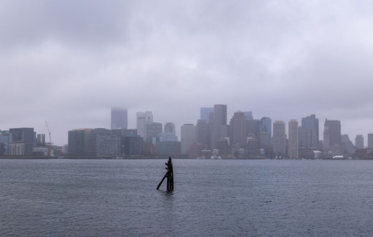 The Boston skyline over water.