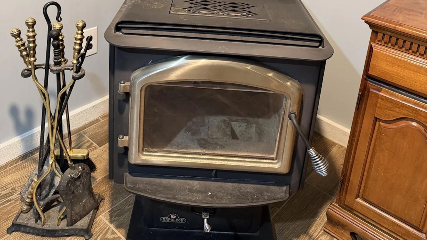 A wood stove and its tool set.