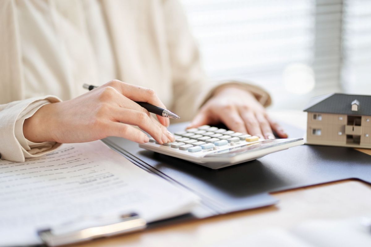 A person using a calculator.