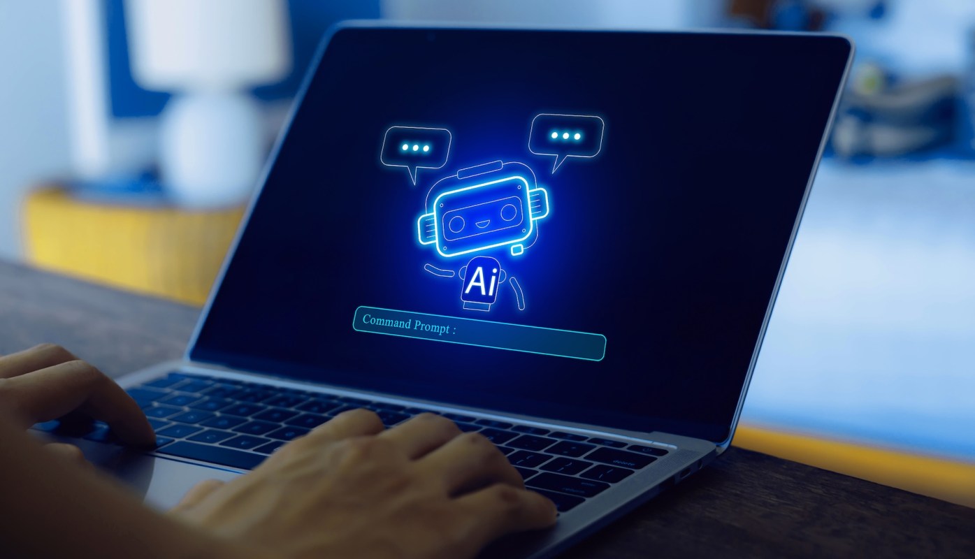 An AI command prompt on a laptop.