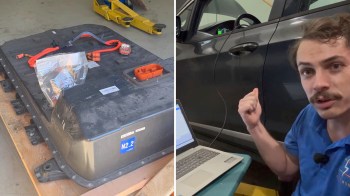 A battery pack with connectors is displayed on a table alongside a person explaining on a computer.