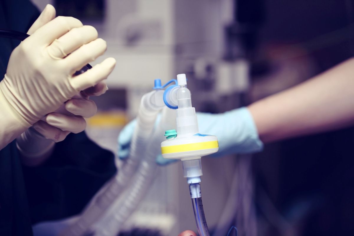 Hospital workers in a critical care unit.
