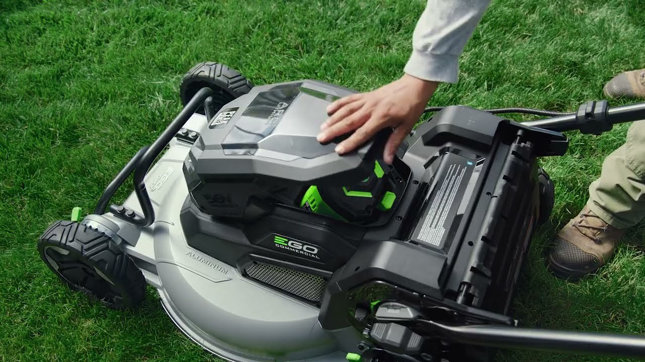 An Ego mower with the battery compartment open.