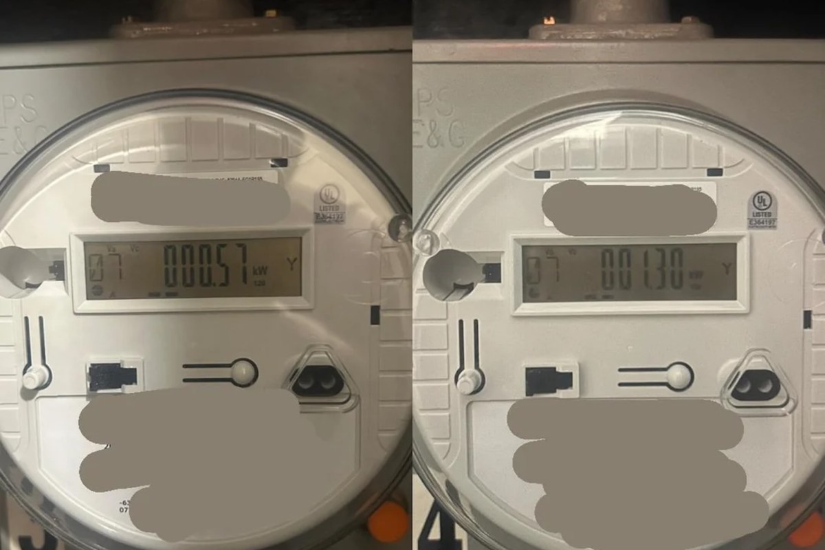 Two electric meters displaying different energy readings: one shows 0.057 kWh and the other 0.130 kWh.