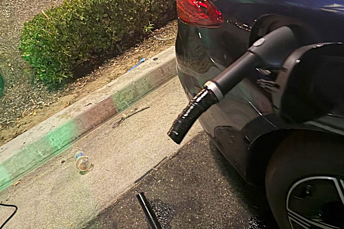 A charging cable stuck in an electric vehicle.