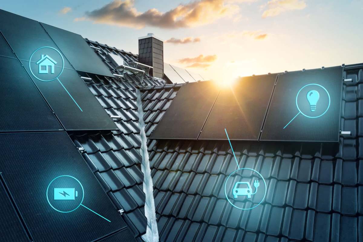 Solar panels on a rooftop with icons representing home energy, battery storage, and electric vehicles.