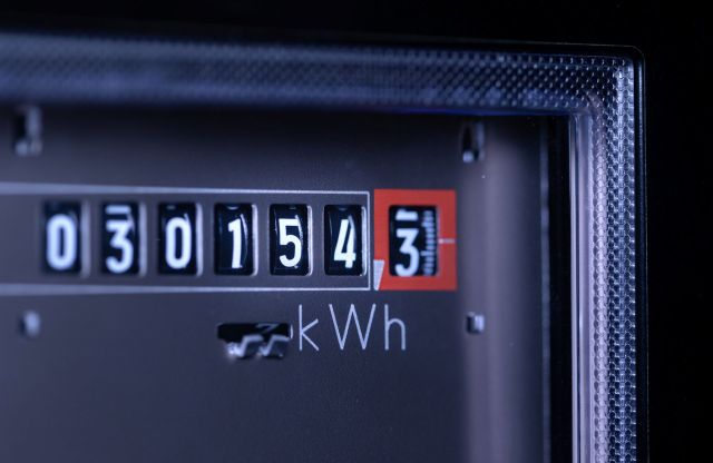 An electric meter going up.
