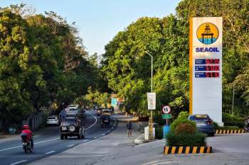 The entrance to a petrol station in the Philippines.