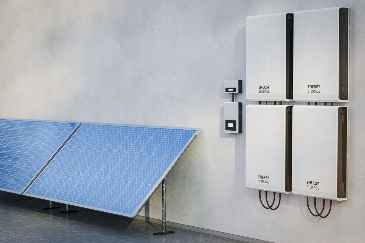 Solar panels with energy storage units mounted on a wall.