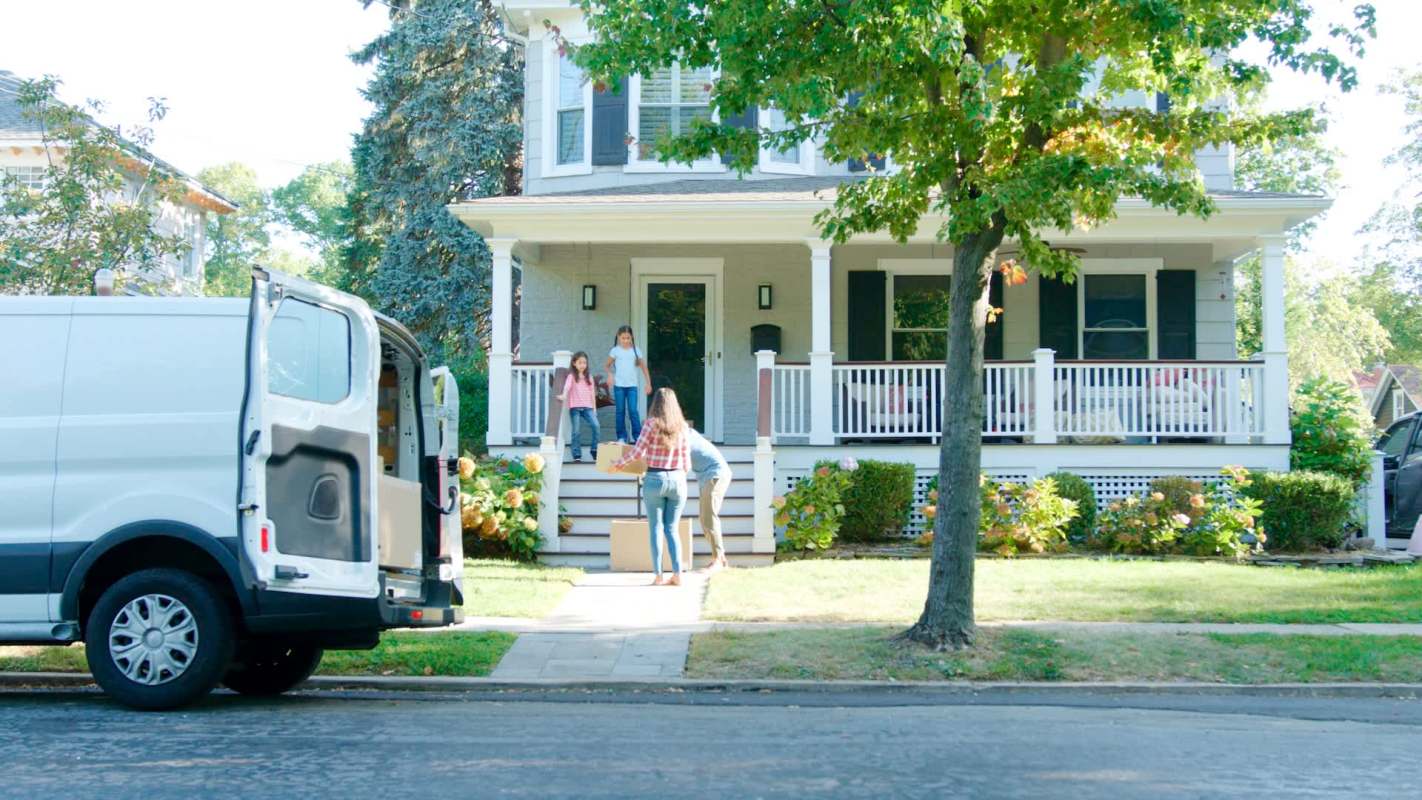 A family moving into a house.