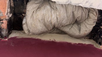 A comforter in a chimney flue.