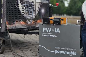A PopWheels inverter adapter next to a food cart.