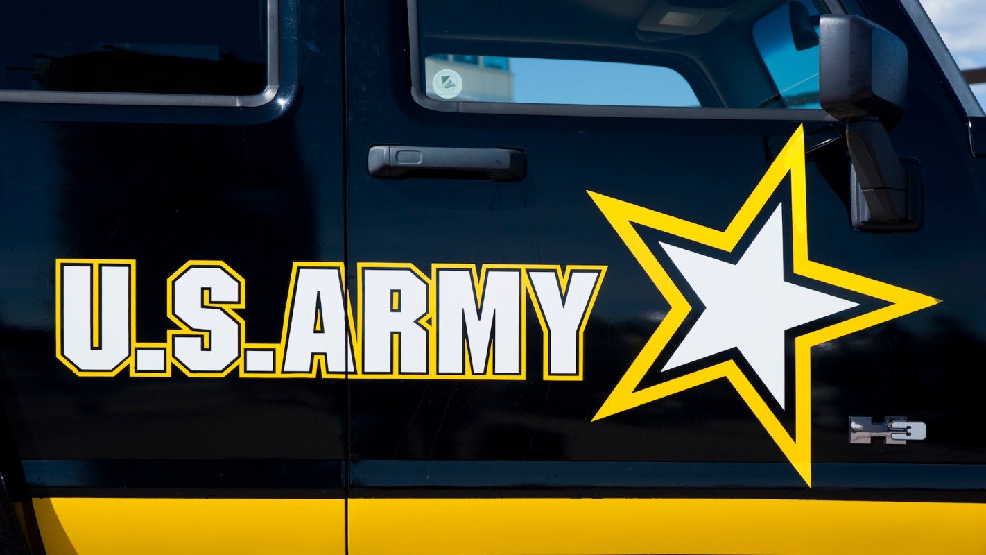 A U.S. Army logo with a star displayed on the side of a vehicle.