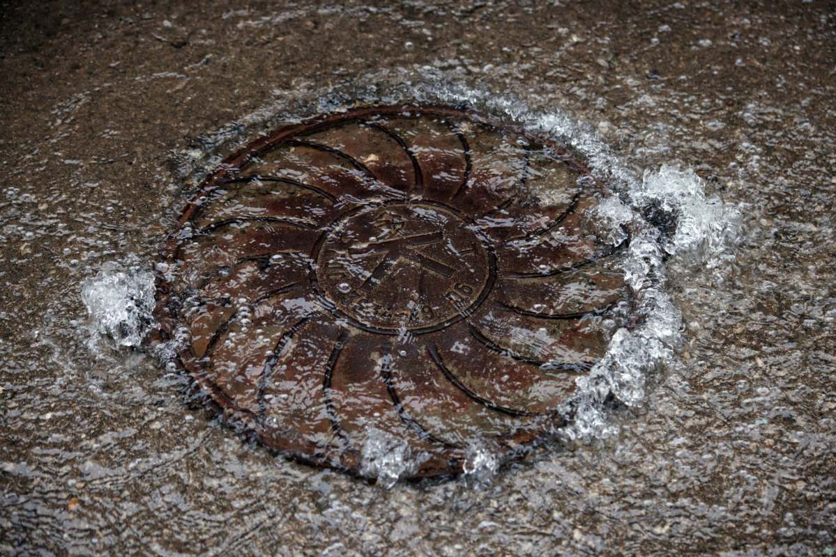 Water flowing out of a manhole.