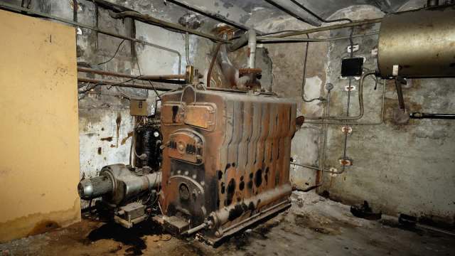 An old, rusty furnace.