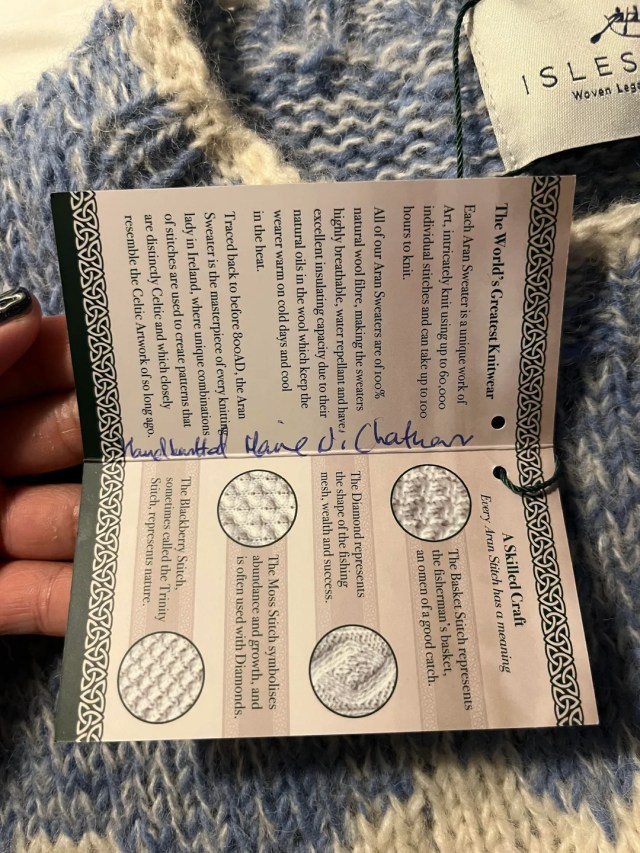 A tag on the sweater.