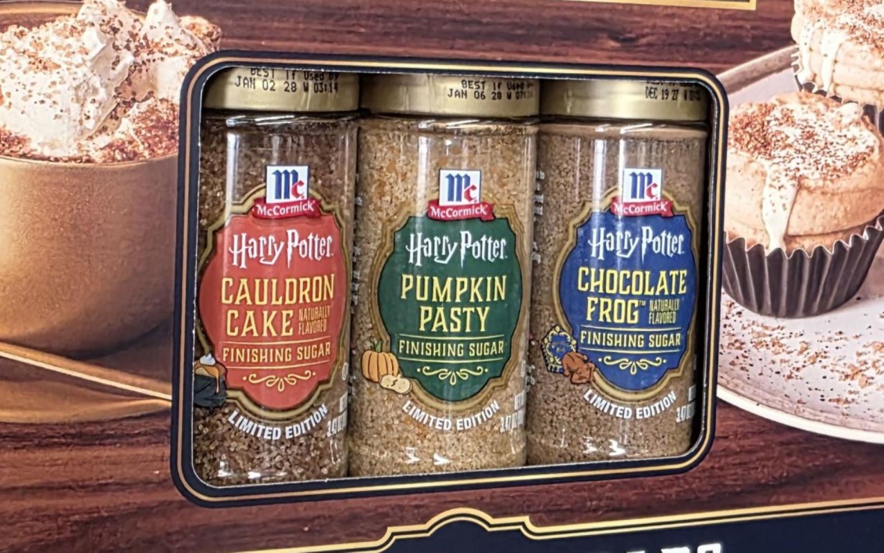 Three jars of Harry Potter-themed finishing sugars labeled "Cauldron Cake," "Pumpkin Pasty," and "Chocolate Frog."