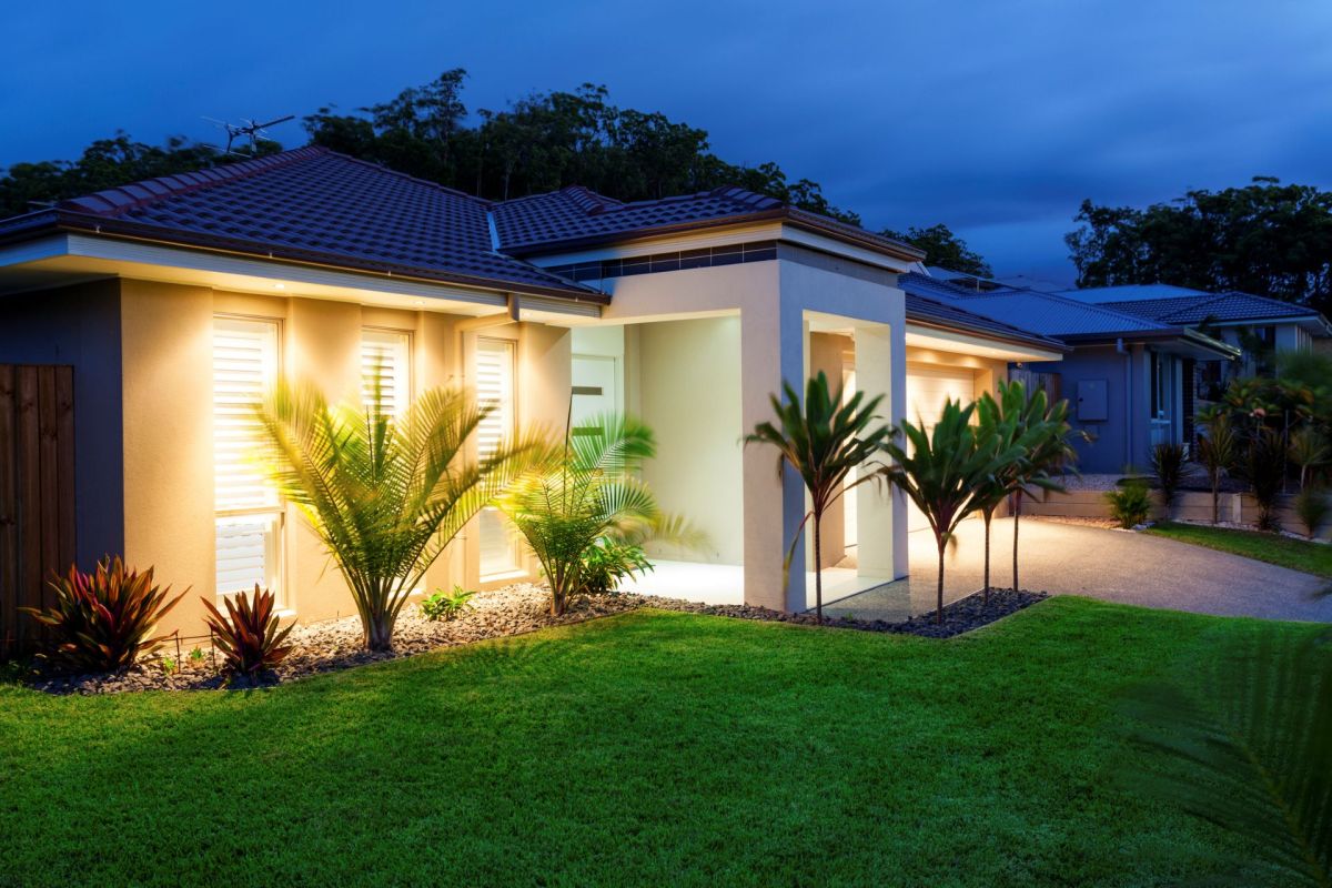 A home with lights on at night.
