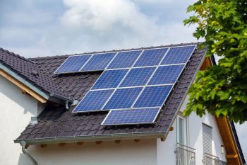 Solar panels installed on a roof of a house.