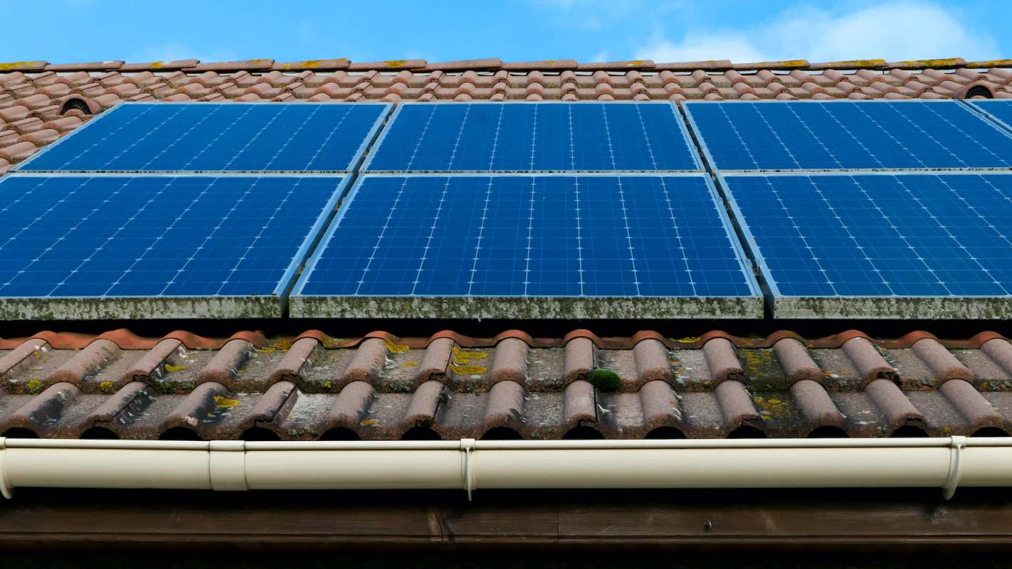 Solar panels installed on a tiled roof.