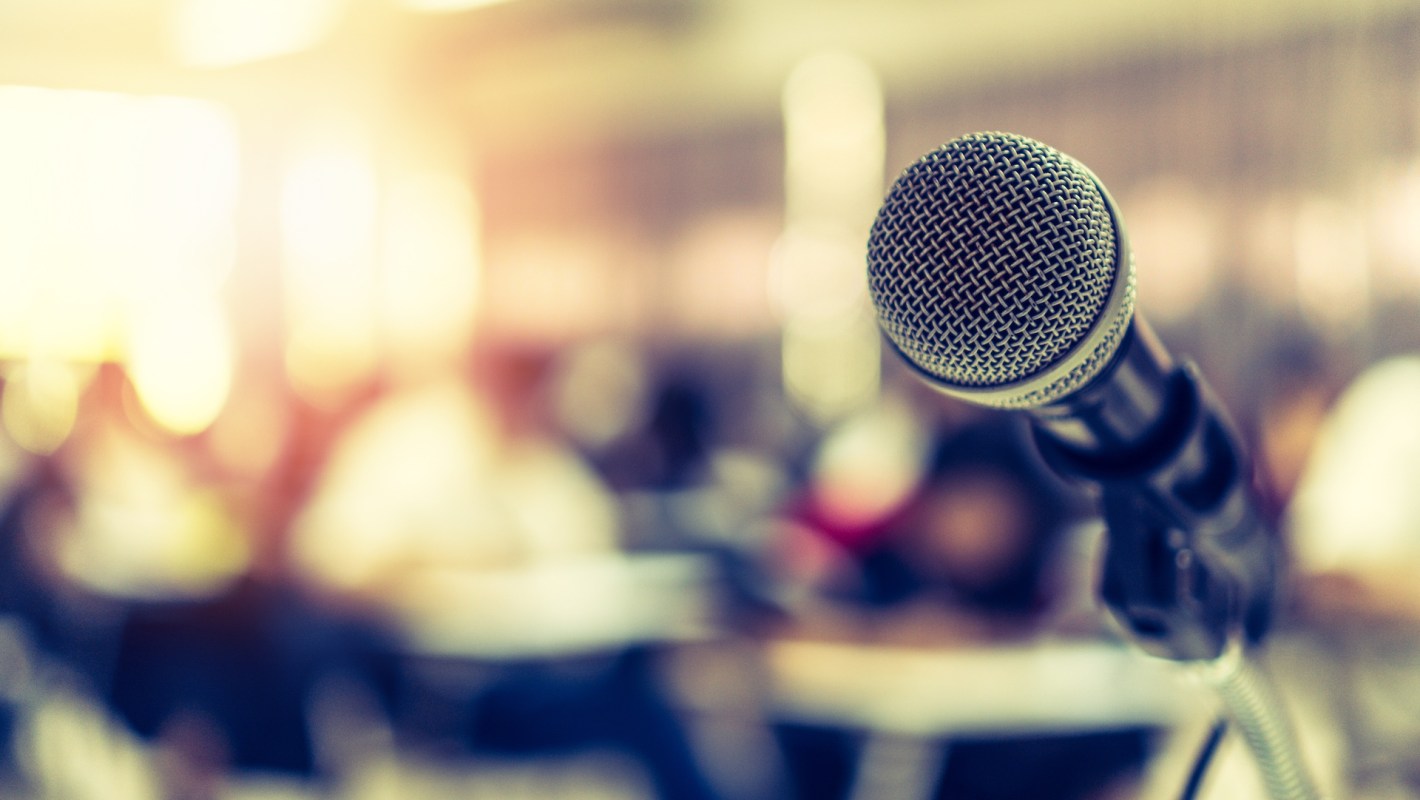 A microphone at a podium.