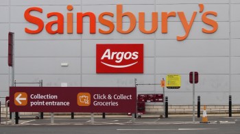 A sign for Sainsbury's and Argos with information about collection points and grocery pickup.