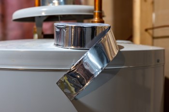 Metallic HVAC tape on a water heater.