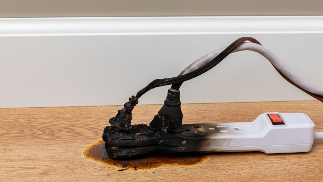 A burnt power cord and extension cord.