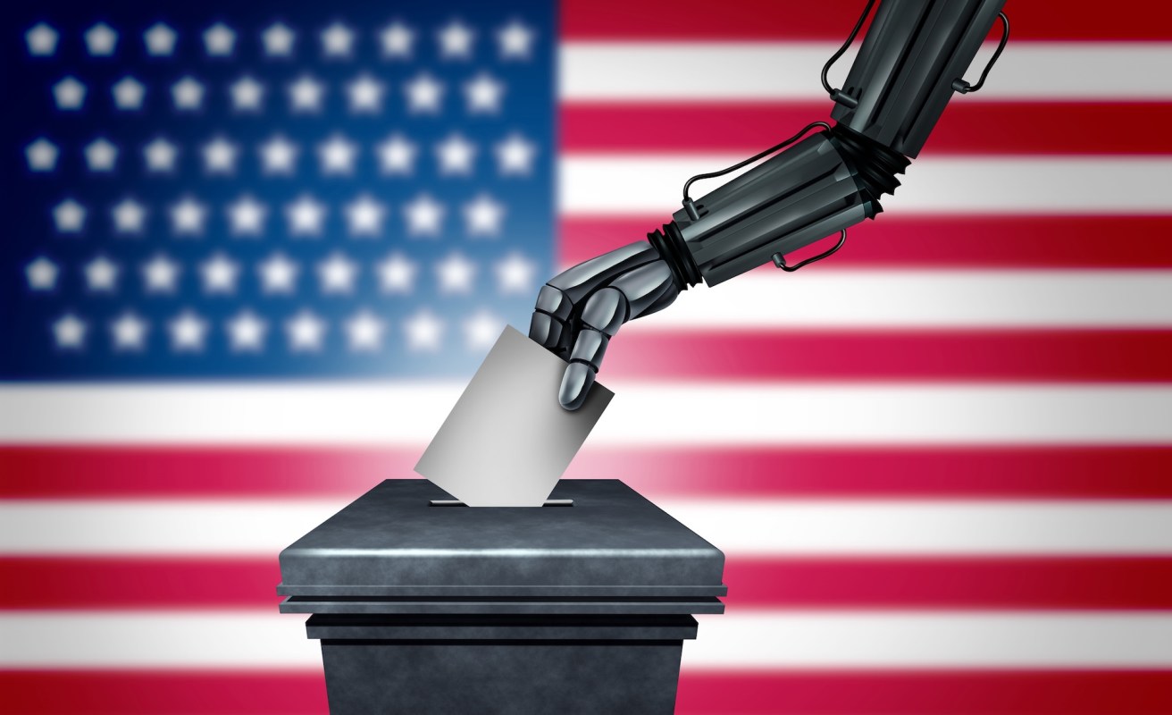 A robotic hand placing a ballot into a ballot box with an American flag background.