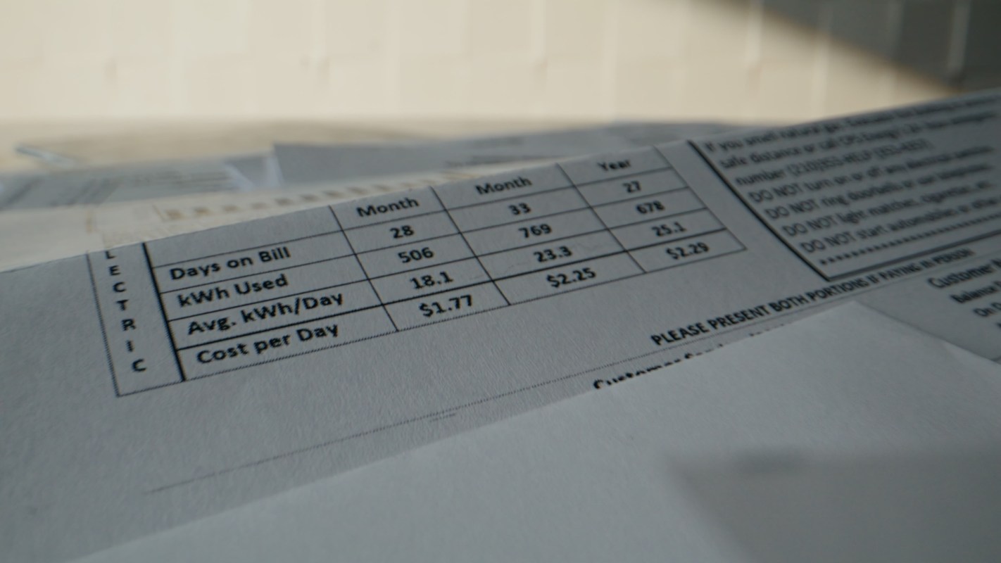A close view of an electricity bill showing usage details and cost information.