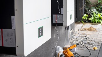 Two wall-mounted battery storage units.