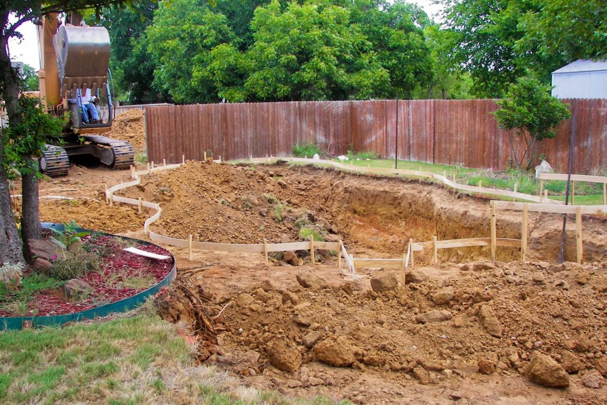 Outdoor swimming pool under contruction.