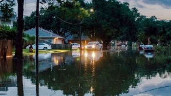 A flooded residential street.