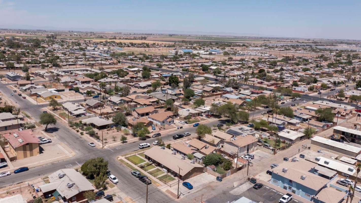 An aerial view of a residential neighborhood with numerous houses and streets.