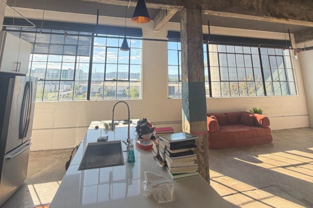 A loft with large windows.