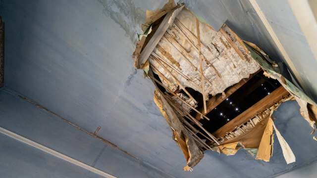A large hole in a ceiling.