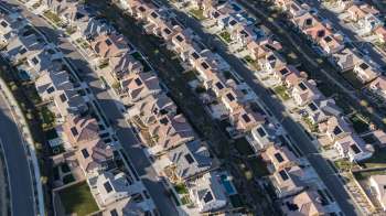 Rows of houses with solar panels.