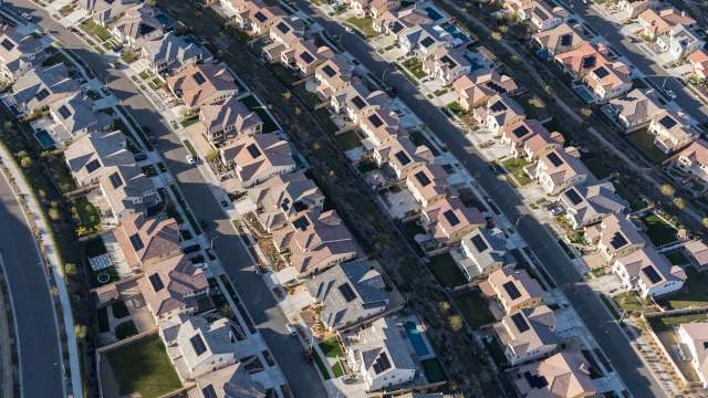 Rows of houses with solar panels.