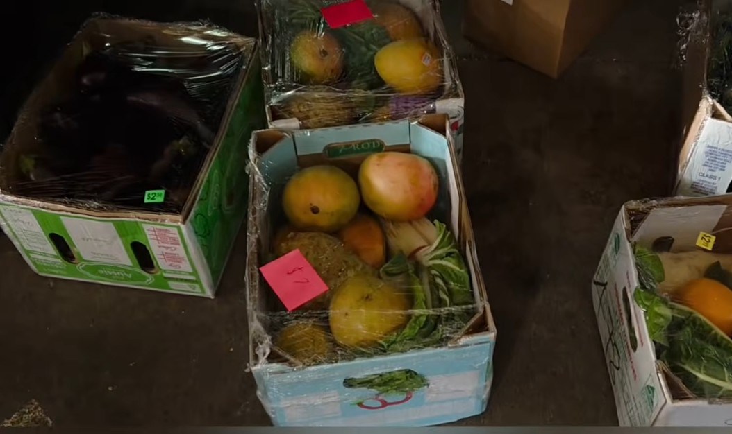 Boxes of bargain produce.