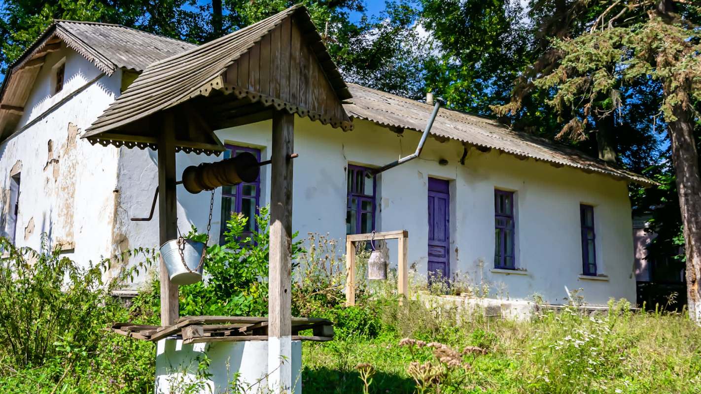 An old house with a well.