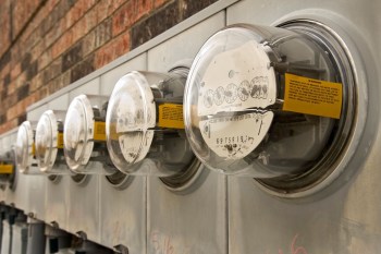 A row of electric meters.